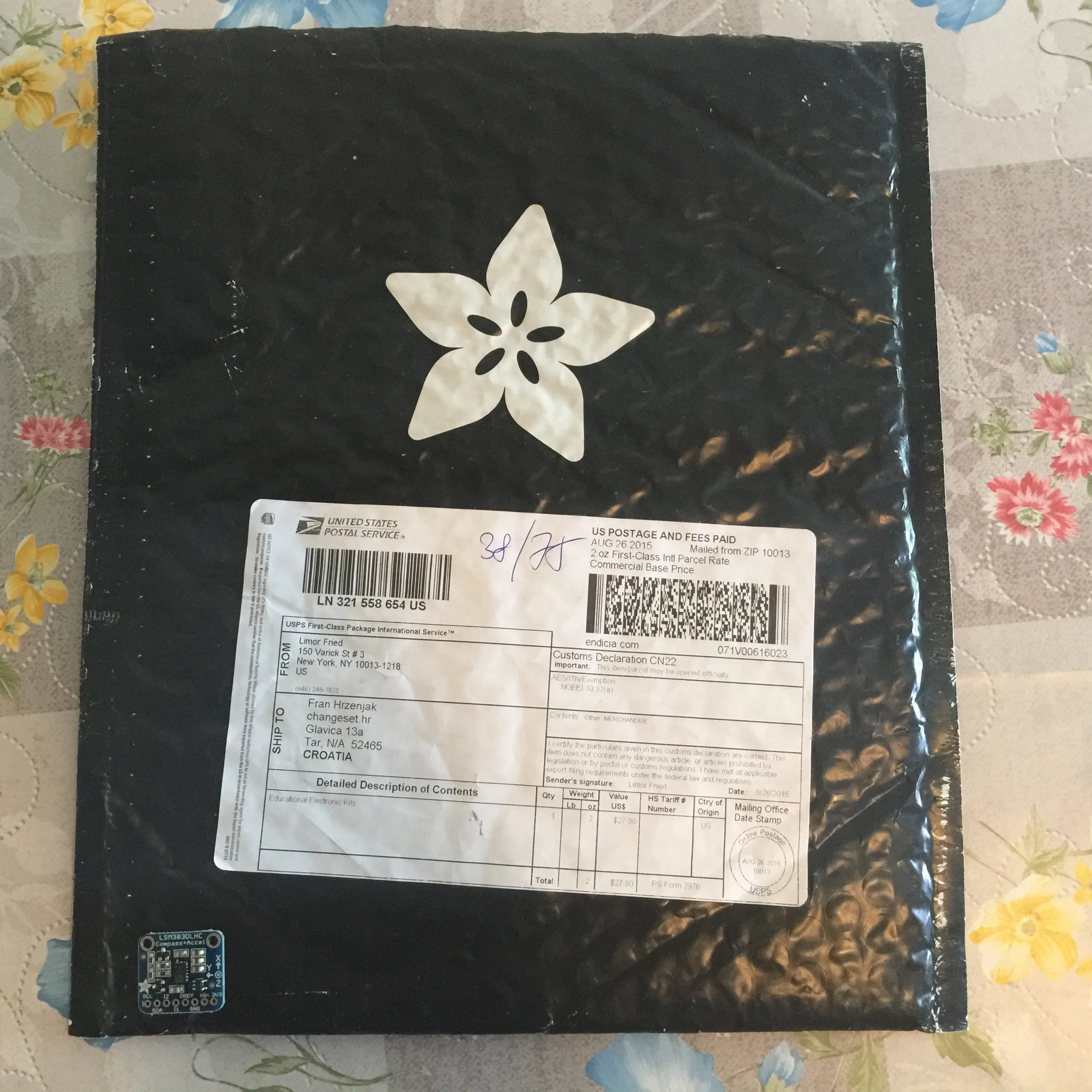 Adafruit can pack their stuff! Can you find the one device that came in this envelope?