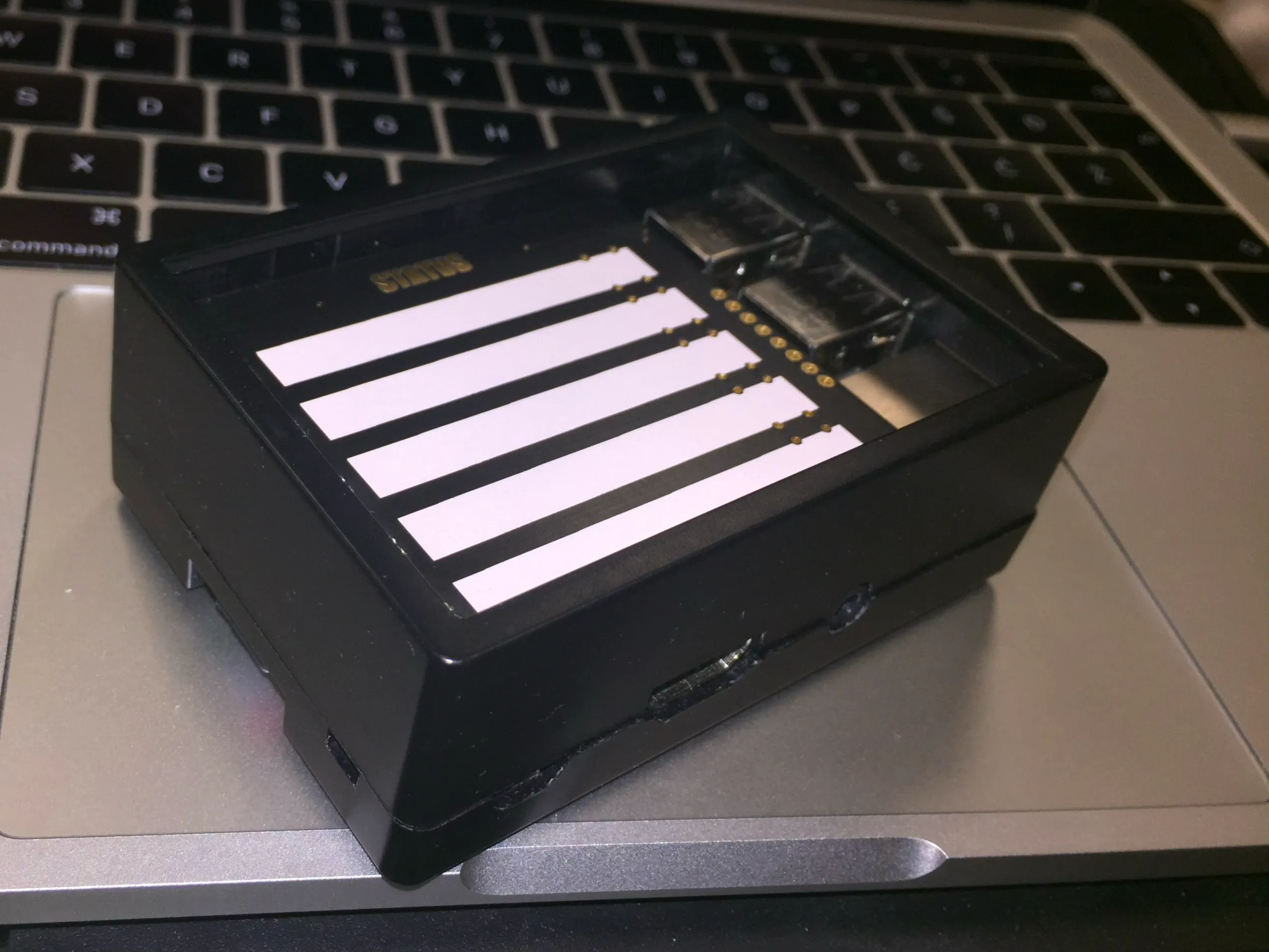 Raised status board inside case